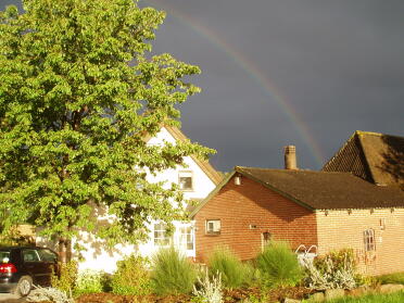 Regenboog over ons huis