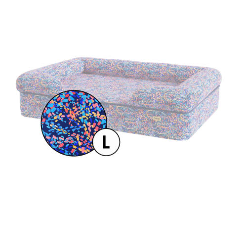 Grote bolster hondenbedovertrek in patterpaws neon print van Omlet.
