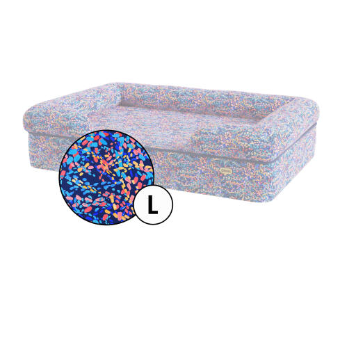 Grote bolster hondenbedovertrek in patterpaws neon print van Omlet.