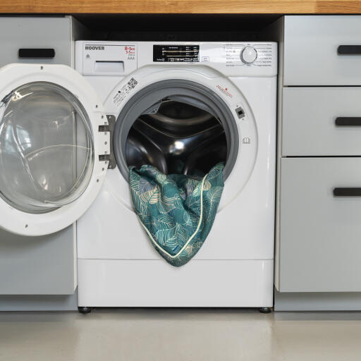 Groene Omlet hondenbedovertrek in de wasmachine