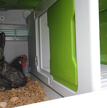 Een knusse Nestkast met schuifdeur
