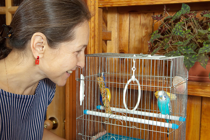 woman with budgie